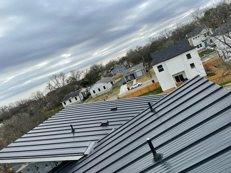 Standing seam metal roof panels with vents for Skylight Repair in Seabrook